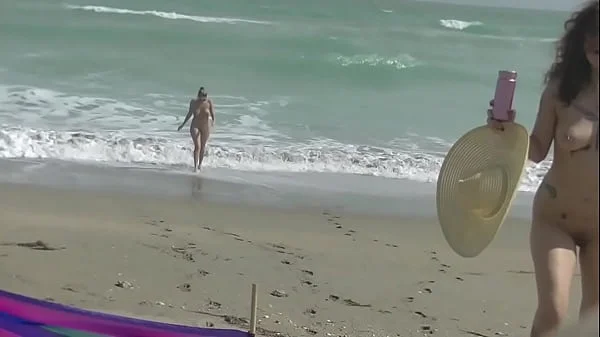 Exhibitionist Wife 484 Part 5 - Mrs Ginary and Mrs Nikki Brooks Teasing Nude Beach Voyeur!  Spreading legs and teasing cocks in public!