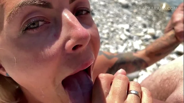 Slender tanned blonde gets fucked on the beach by the sound of waves during a photo shoot