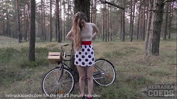 skinny areana fox riding a bicycle nude outdoors in a forest and masturbating