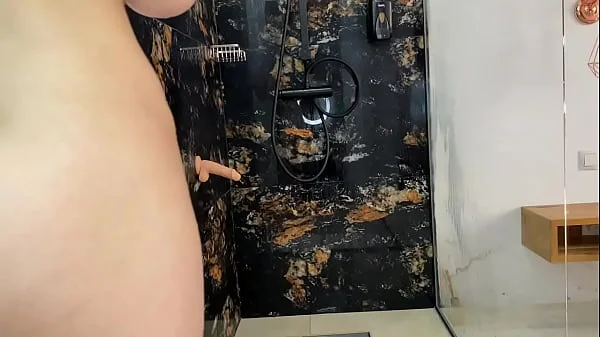 Slutty student bitch fucks her dildo in shower