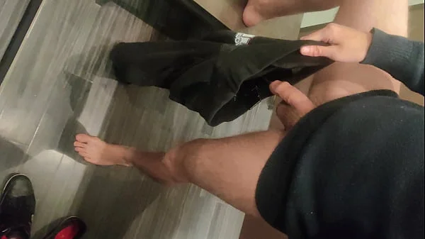 Pissing in a Fitting Room, Using a Pair of Pants