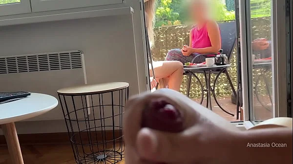 My husband is jerking off and cum in front of my stepmom a while we talk on balcony.