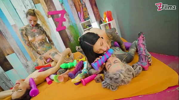 4 alternative CUTE LESBIANS in crazy colorful TOY ORGY fucking each others cunts and ASS