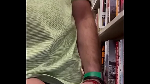 Jerking off at the bookstore. Public masturbation