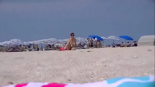 Exhibitionist Wife 69 - Lana goes TOPLESS with 38DD TITS and PUSSY FLASHING on a PUBLIC BEACH while chatting on the phone with her husband!